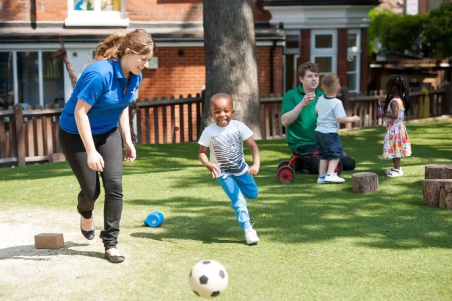 Education-employees-play-with-children-nursery-Bright-Horizons