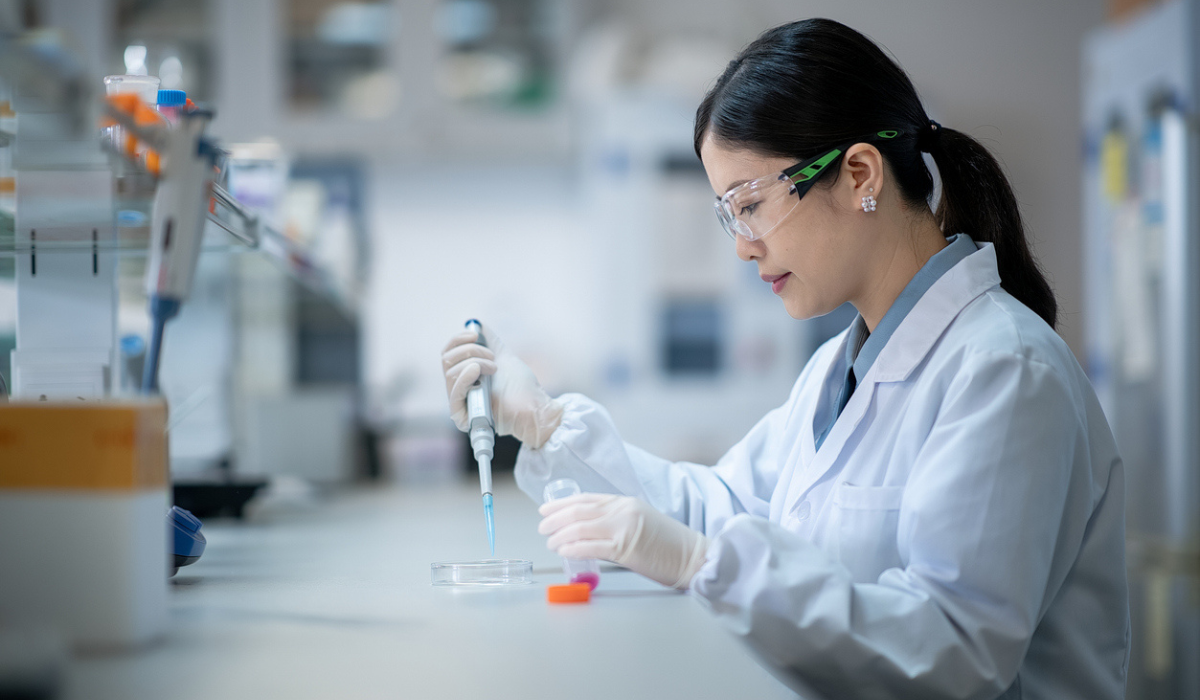 WomaninLabCoatWorkinginLab