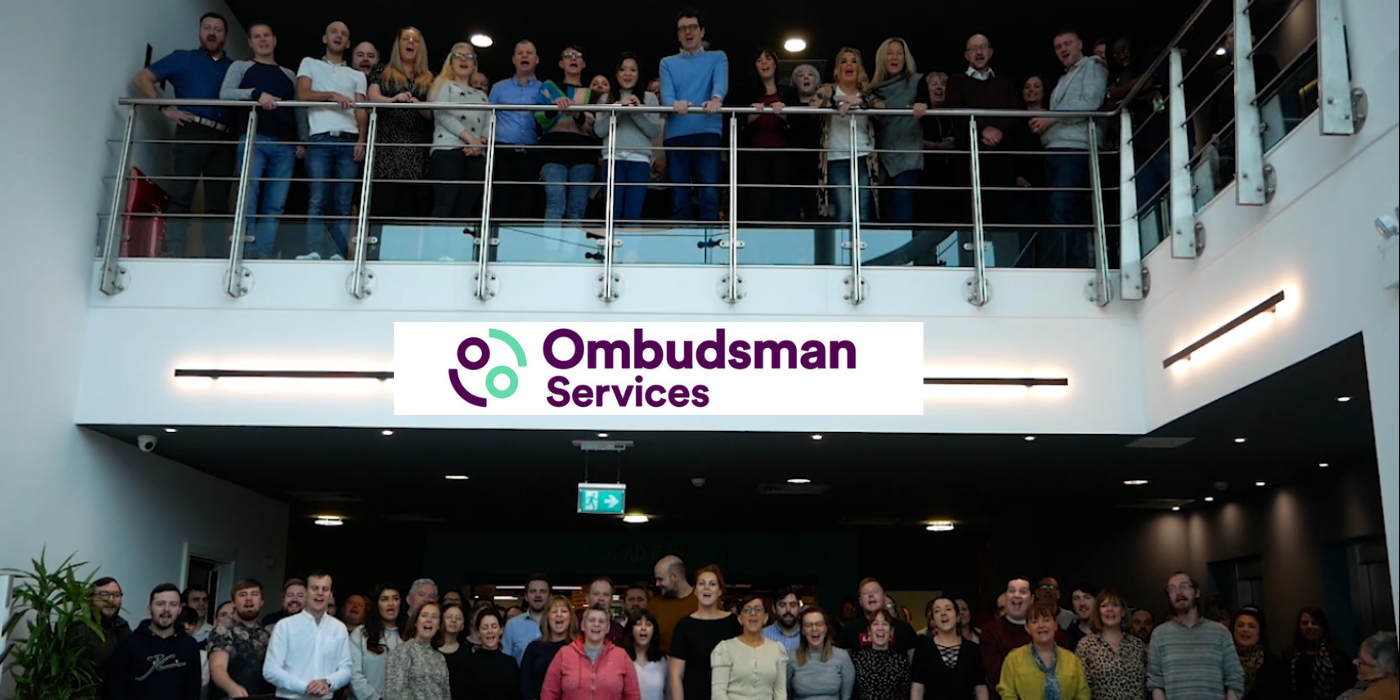 Ombudsman-Services-employees-group-photo-trust-in-leadership