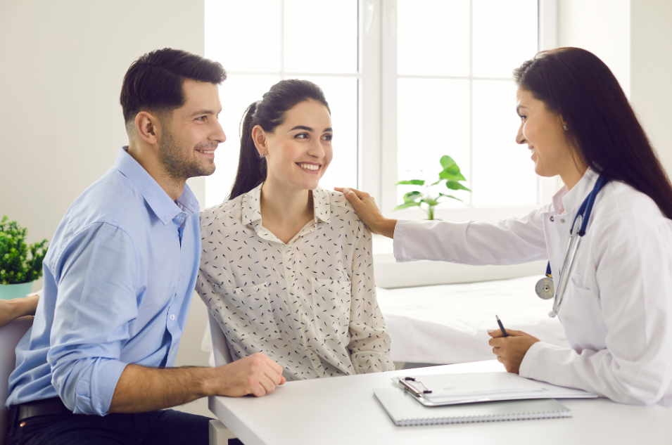 couple talking to fertility doctor