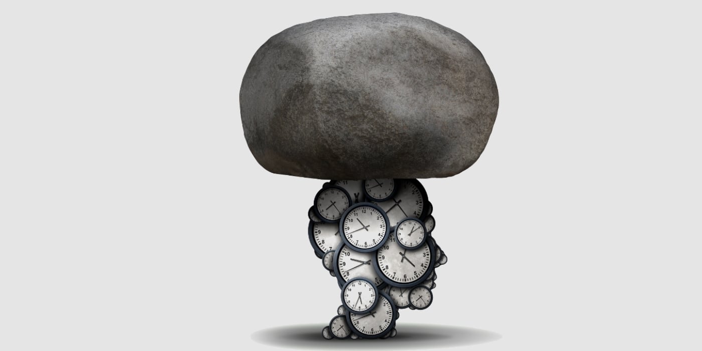 stress-time-face-clocks-stone-employee-mental-wellbeing-blog